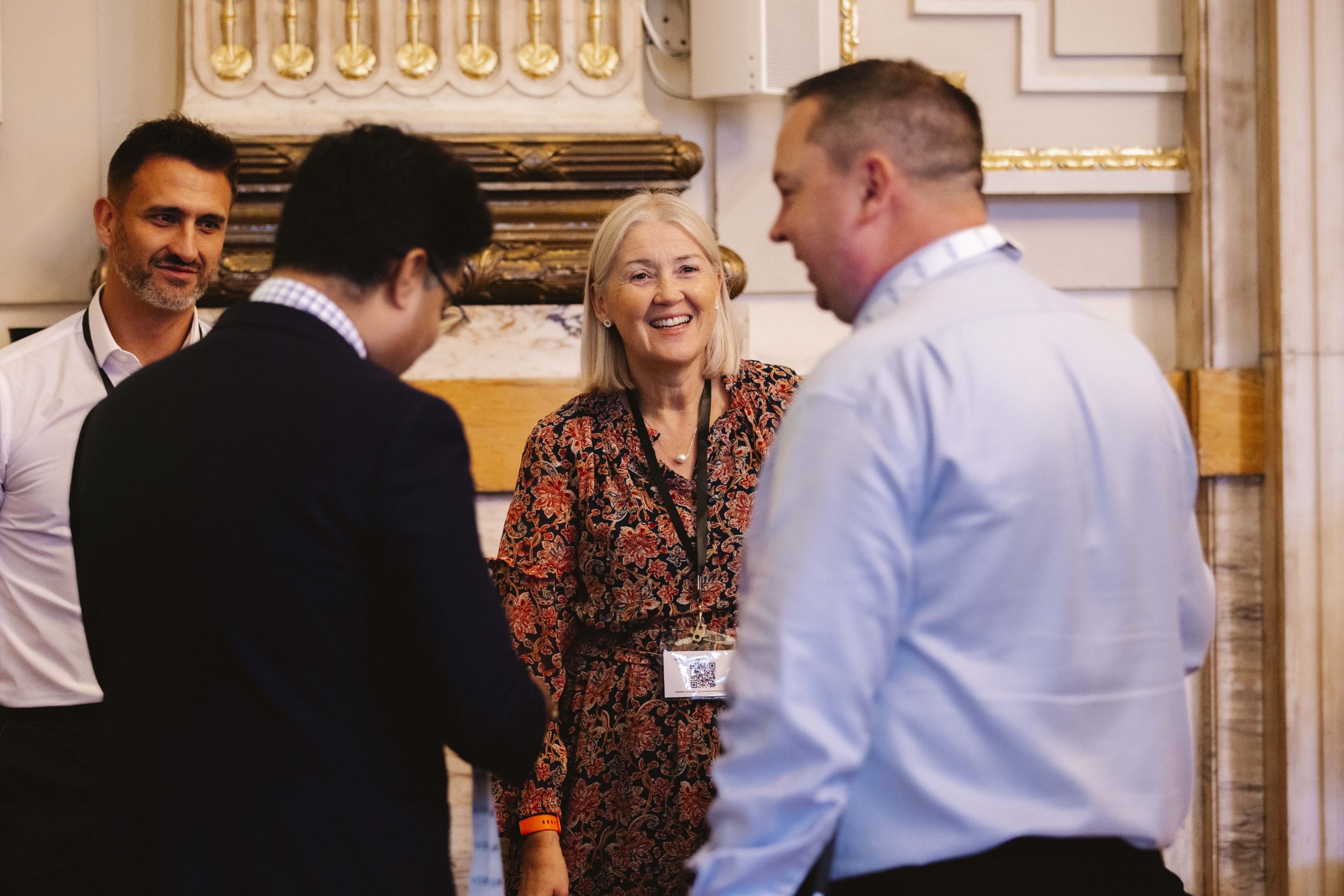 Customer experience professionals networking and sharing ideas