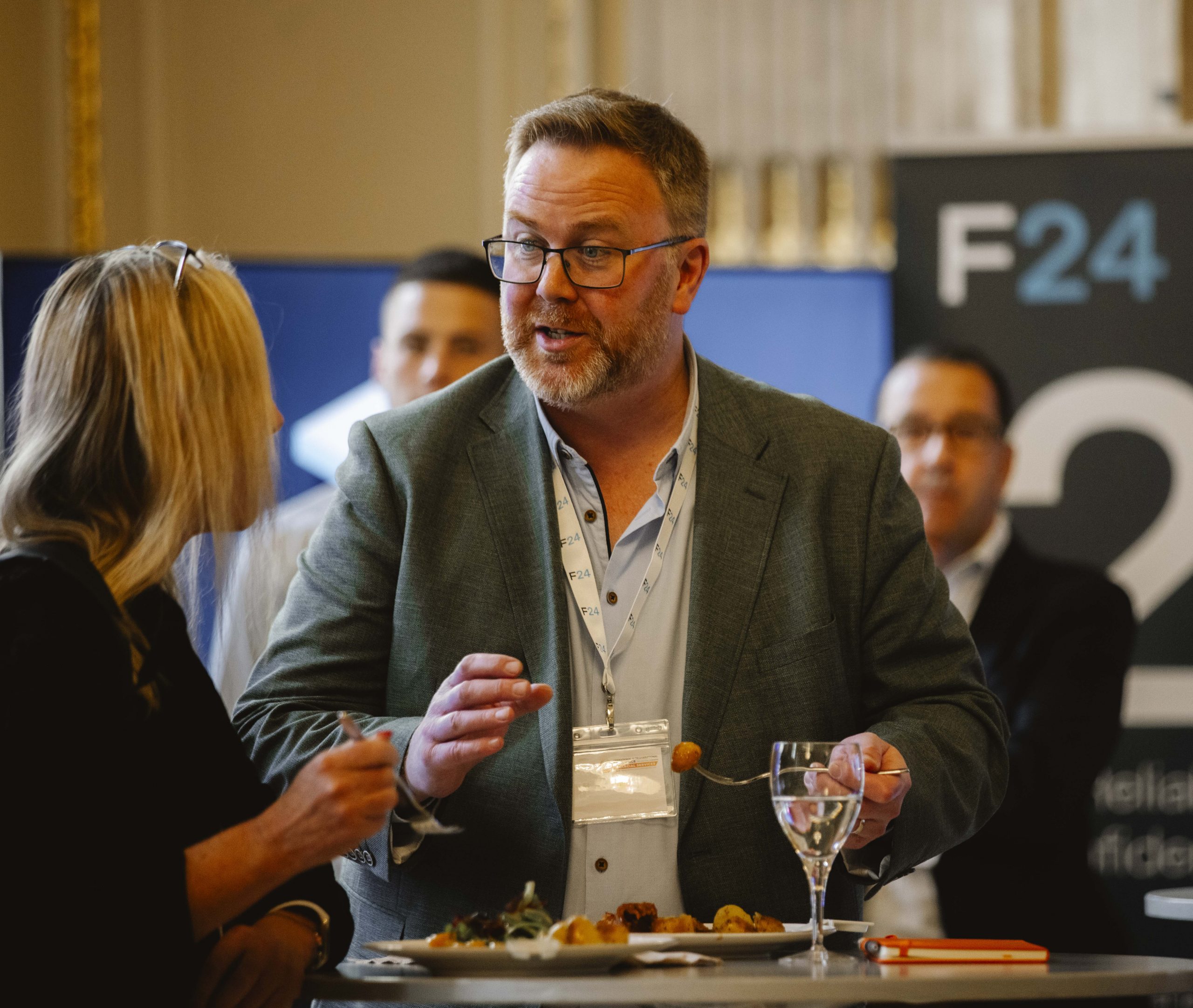 Attendees networking at The Customer Experience Conference
